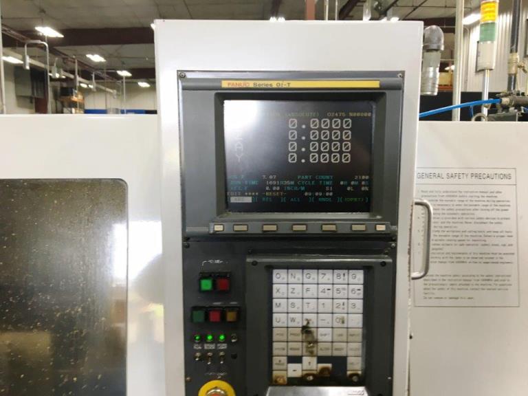 1/2 , HANWHA SL12E, FANUC 0IT, 2002, 6OD/5ID-BW, MTA Magazine BF